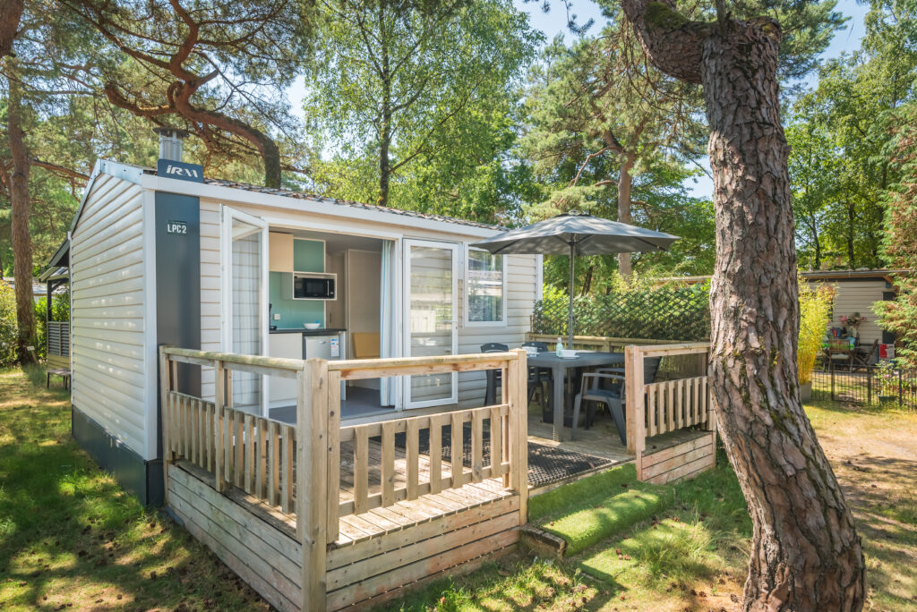 Vrijstaand Chalet Cahita Riviera te midden van bosrijke omgeving in Bos Park Bilthoven